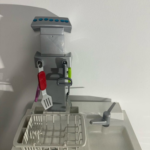 Children's kitchen used with accessories