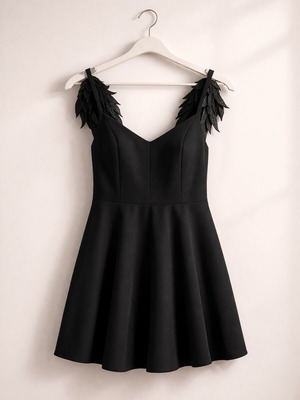 Black dress with angel wings on back like new