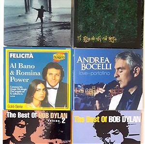 6 CD με τραγούδια. 2 με τους Πυξ λαξ, 1 με τον Αl Bano & Romina Power και 2 τα the best of Bob Dylan.