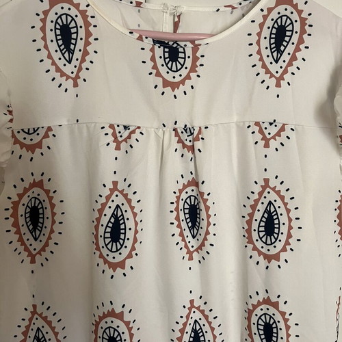 Dress with eye motifs and ruffles on sleeves and hem one size new
