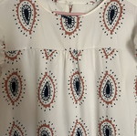 Dress with eye motifs and ruffles on sleeves and hem one size new