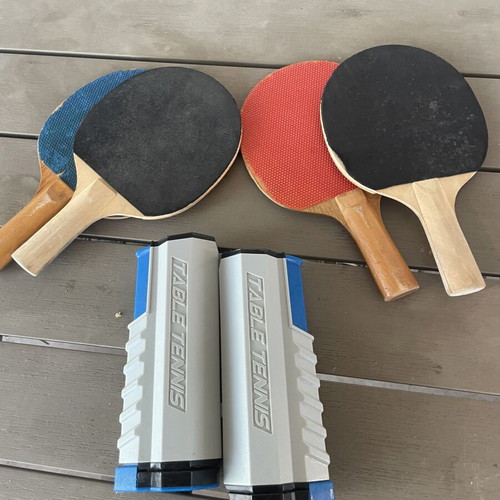 Ping pong net with rackets used, good condition