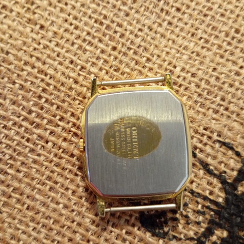 Orient watch octagonal used, no strap, black and yellow
