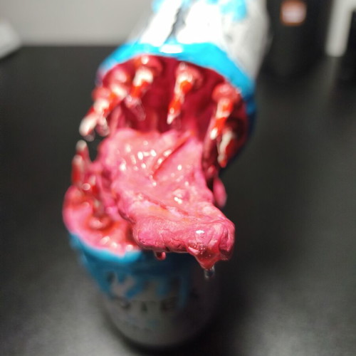 Handmade monster figure from Monster can with clay and UV resin