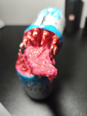 Handmade monster figure from Monster can with clay and UV resin