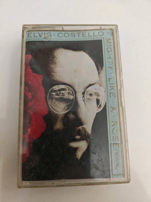 Elvis Costello Mighty Like A Rose cassette album used, rock