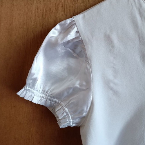 White blouse with satin ruffles and decorative crystal buttons, like new