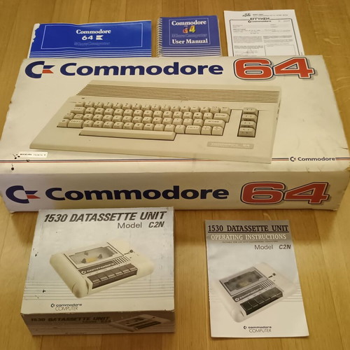 Commodore 64C used with original power supply, cassette player, and manuals