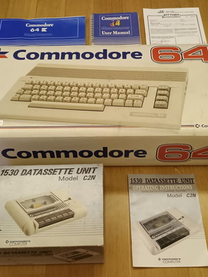 Commodore 64C used with original power supply, cassette player, and manuals