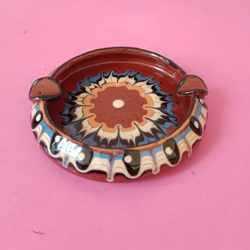 Clay ashtray folklore like new