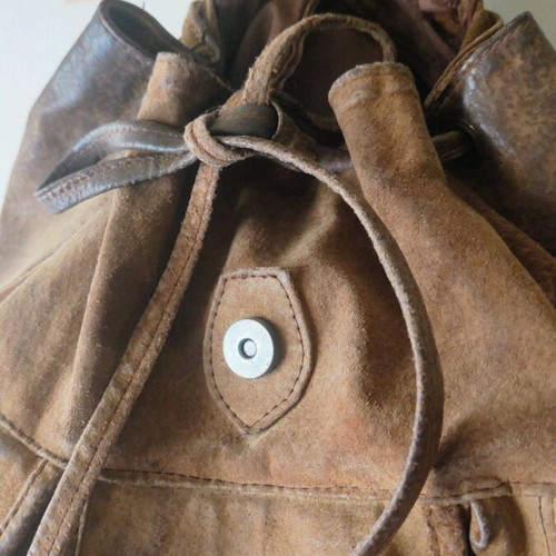 Handmade leather backpack used with adjustable straps