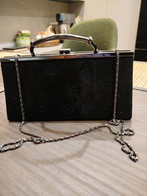 Black evening clutch bag like new with silver chain