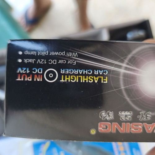 Flashlight new with rechargeable batteries and dual voltage