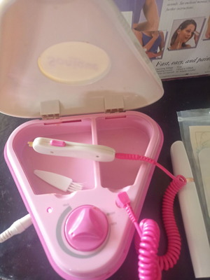 Electric hair removal device like new for home use