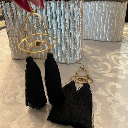 Dangling earrings with black tassels and gold details like new