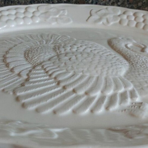 Large ceramic oval platter with embossed design like new