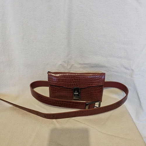 Crossbody and waist bag with croco texture and metallic details like new