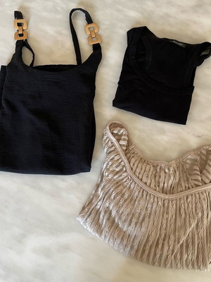 Pack of three shirts like new, two black and one semi-transparent sand color