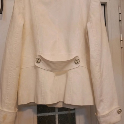 Women's jacket used white cotton with silver buttons
