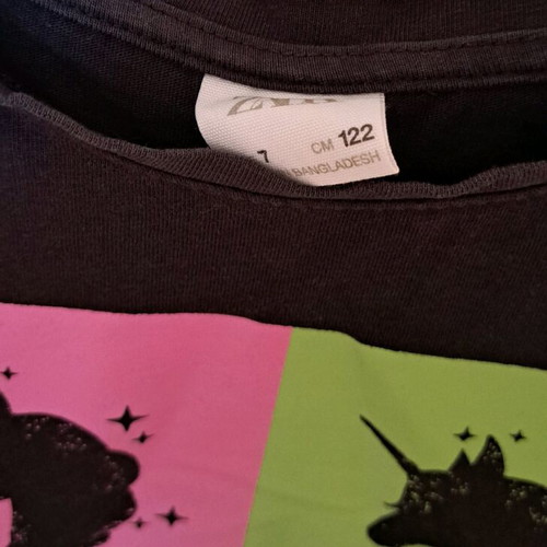 Zara blouse used with unicorn for 7 years old, black