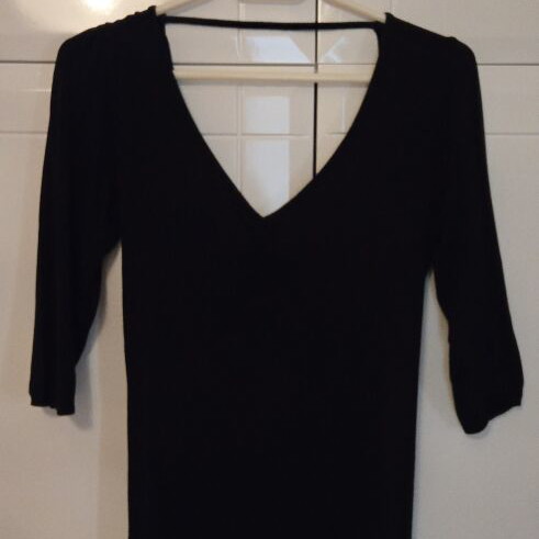 Blasting black fitted dress with open back, size M