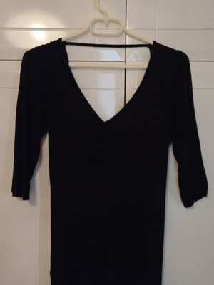Blasting black fitted dress with open back, size M