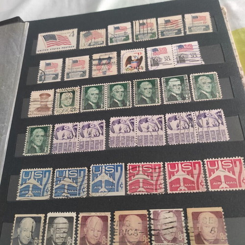 Stamps like new, 702 pieces with album