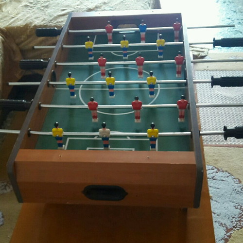 Wooden tabletop foosball with legs, dimensions 37×70×23