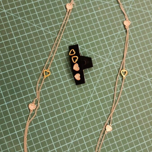 Long double chain with hearts and two pairs of earrings new, gold and silver