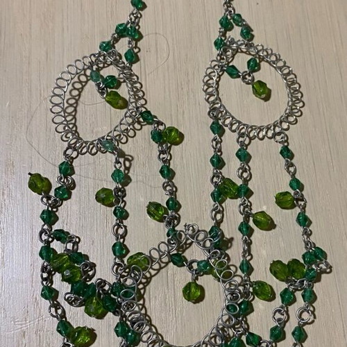 Necklace new with green beads and silver details