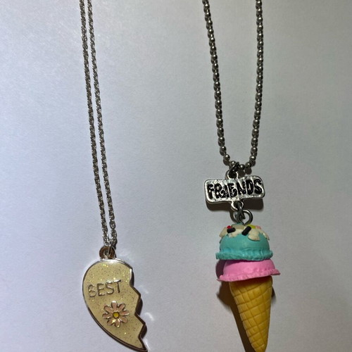 Claire's necklace like new with thin chain and half heart design
