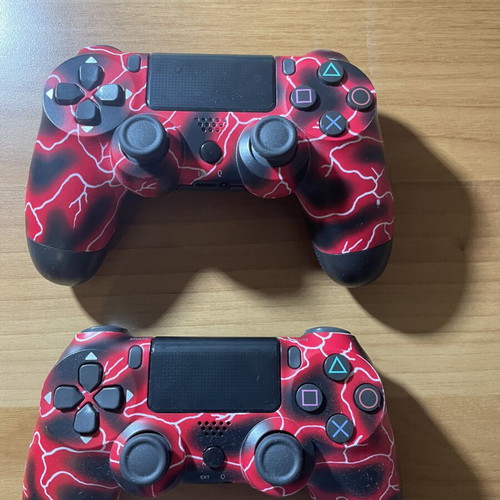 PlayStation 4 console with 2 controllers, NBA 2K25, FIFA 20, Minecraft