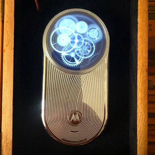Motorola Aura used silver mobile phone