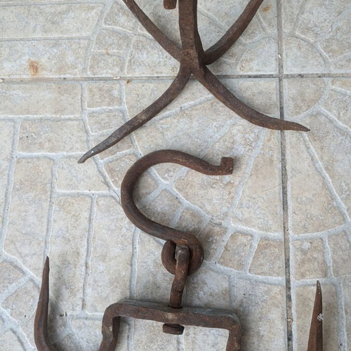 Vintage forged iron meat hooks and anchor