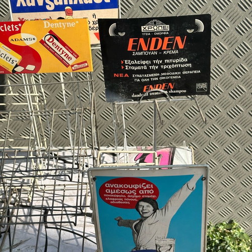 Retro kiosk stand used with authentic vintage advertisements