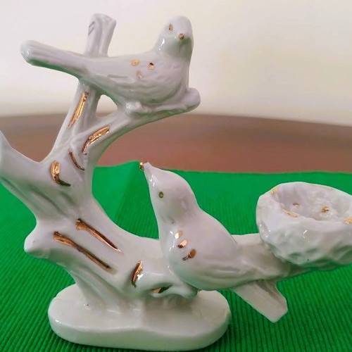 Porcelain decorative figure with birds like new
