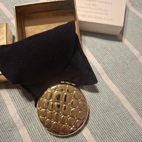 Estee Lauder collectible powder new with gold alligator case