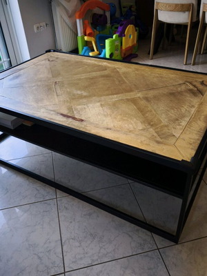 Coffee table used with handmade parquet surface and metal base