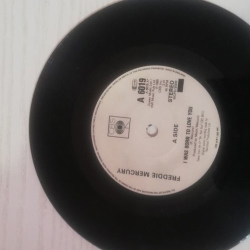 45 RPM vinyl record used with minor cover wear