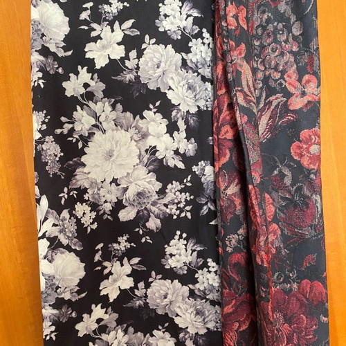 Set of two pencil skirts used, black and white and floral