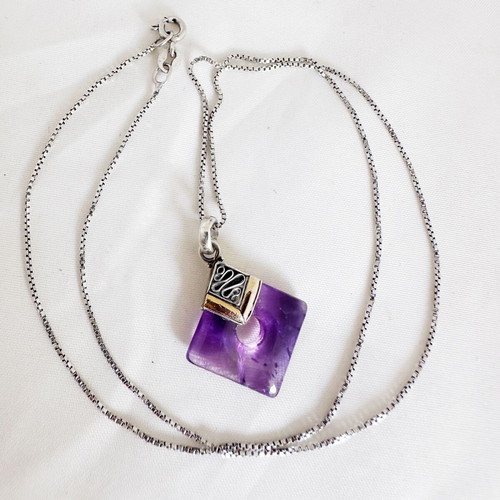 Vintage pendant with amethyst in 925 silver and gold