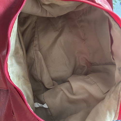 Red hobo shoulder bag like new with decorative details