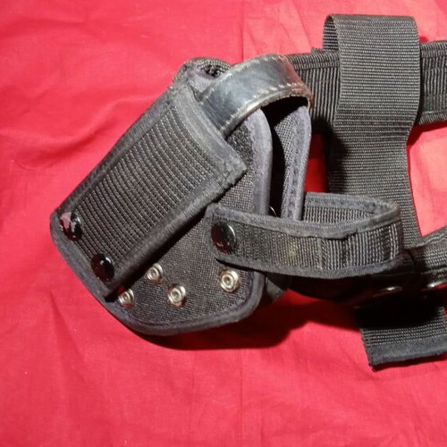 Tactical belt used, black cordura with quick-release buckle and holsters