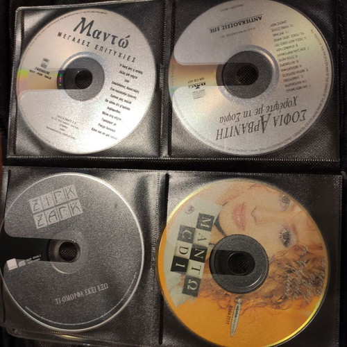 Set of 48 used music CDs with free case