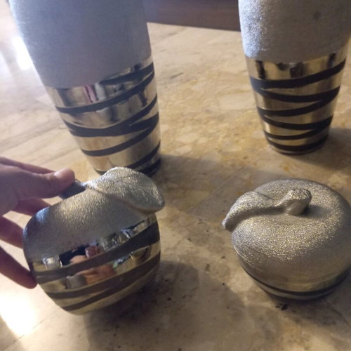 Set of vases with decorative items used