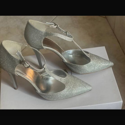 Silver pumps like new with ankle strap and thin heel, size 37