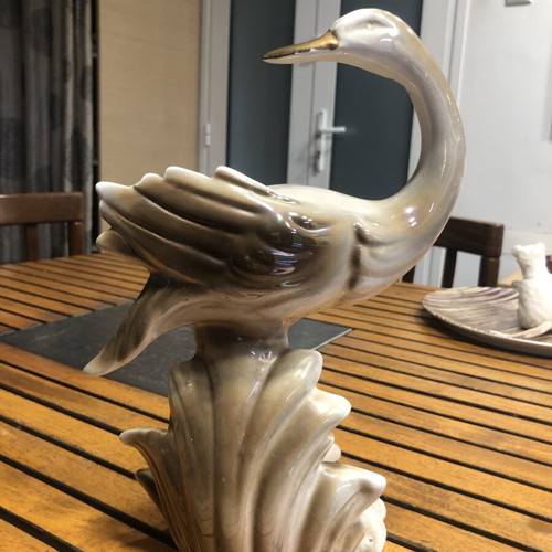 Antique ceramic bird statuette with gold leaf details, 40 years old