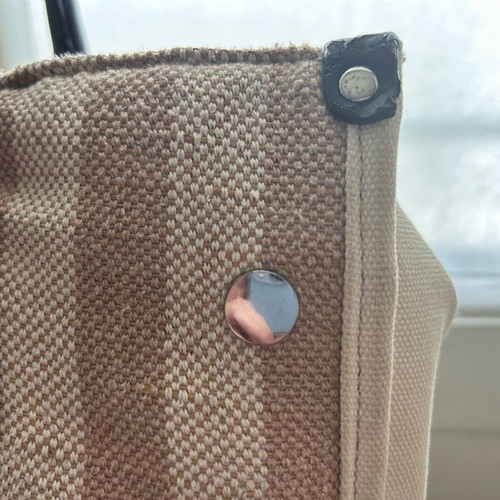 La Carrie large tote bag used, beige striped canvas with leather handles