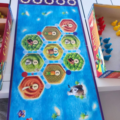 Catan Junior board game like new, missing one yellow pirate lair