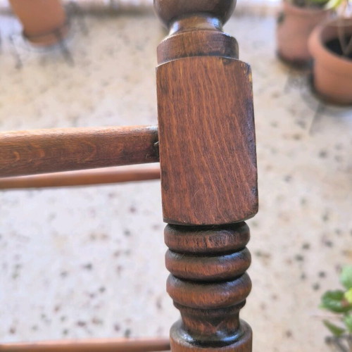 Vintage wicker stool used with wooden frame